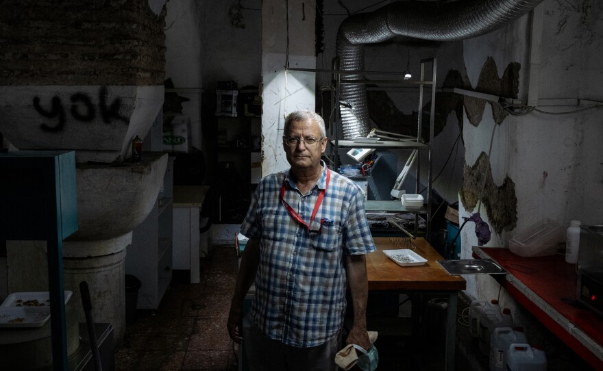 Ozgumus stands in a former cistern built in the 6th century, now the site of a jewelry workshop.