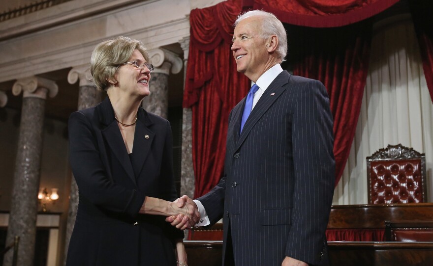 U.S. Sen. Elizabeth Warren participates in a reenacted swearing-in with U.S. Vice President Joe Biden in the Old Senate Chamber at the U.S. Capitol January 3, 2013.