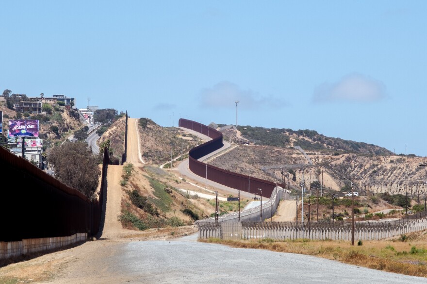 International Hill with Tijuana on the left and the American border walls on the right looking west from the American side June 14, 2022.