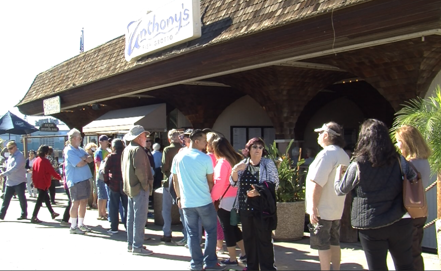 Devoted customers of Anthony's Fish Grotto line up for one last meal before the restaurant closes its doors, Jan. 30, 2017.