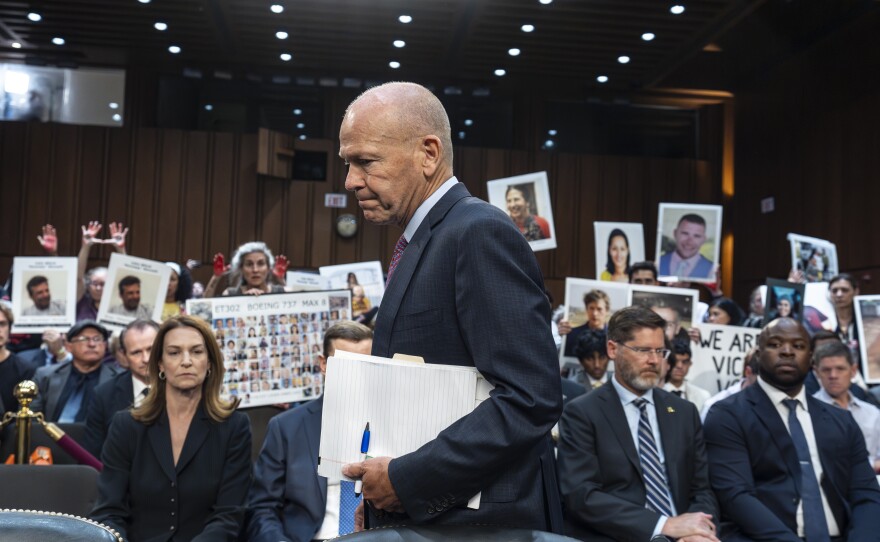 With protesters in the audience, Boeing CEO Dave Calhoun arrives to testify before the Senate Homeland Security and Governmental Affairs Subcommittee on Investigations to answer to lawmakers about troubles at the aircraft manufacturer since a panel blew out of a Boeing 737 Max during an Alaska Airlines flight in January, at the Capitol in Washington, Tuesday, June 18, 2024.