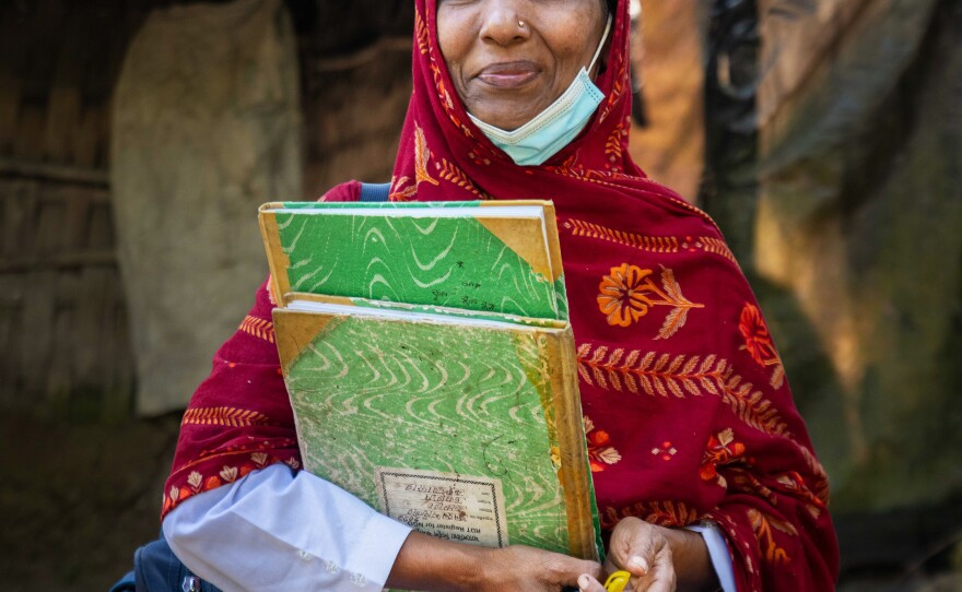 Bulbul Aktar, a health worker, will make daily calls to a patient with malaria to see how they're doing.