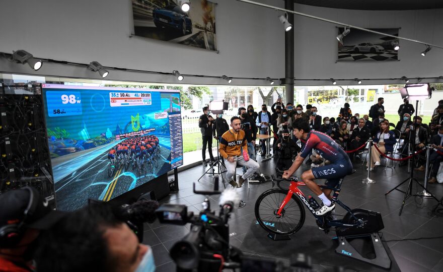 Colombian rider Egan Bernal , the 2019 Tour de France champion, holds a virtual test during a news conference in Bogota on April 2, 2022.