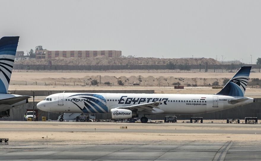 Planes sit on the tarmac at Cairo's airport Thursday after an EgyptAir flight from Paris to Cairo disappeared over the Mediterranean with 66 people onboard.