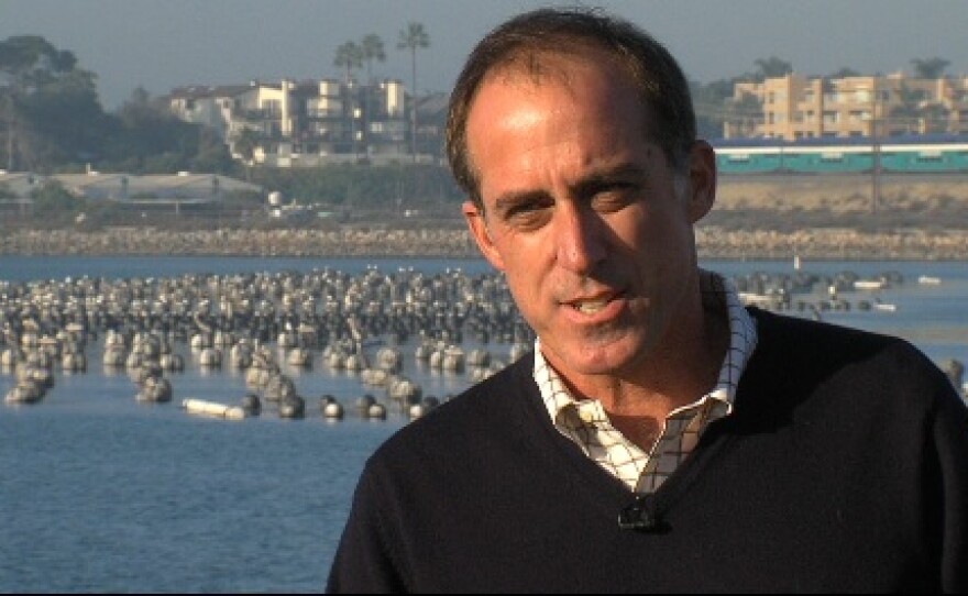 Peter MacLaggan of Poseidon Resources, by the Agua Hedionda Lagoon, where the Desalination Plant will be located