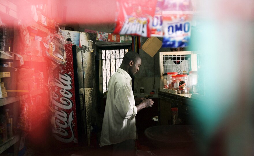 A shopkeeper win Zanzibar, photographed in 2005.