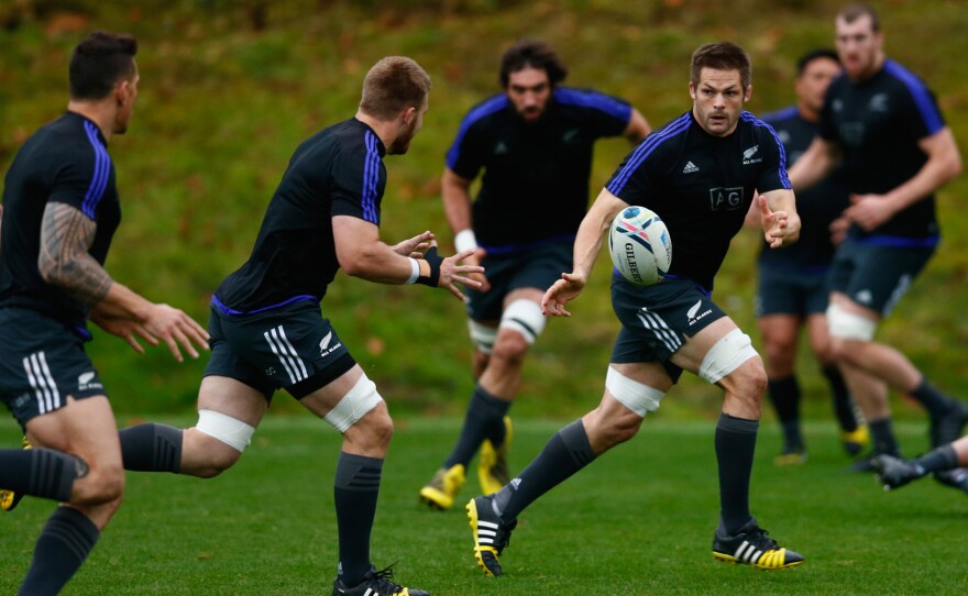 Richie McCaw of the All Blacks passes during a New Zealand training session on Friday in preparation for the World Cup final on Saturday.