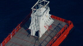 The Joe Griffin barge carrying the containment box which will be used to try to contain the Deepwater Horizon oil spill sits in the Gulf of Mexigo surrounded by oil on May 6, 2010 in Venice, Louisiana. The Deepwater Horizon oil rig operated by BP is leaking an estimated 5,000 barrels of oil a day into the Gulf. (Photo by Chris Graythen/Getty Images)