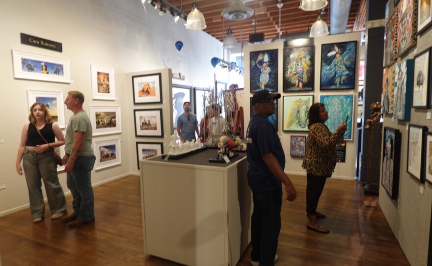 People admiring art at Exclusive Collections Gallery in Gaslamp Quarter on Nov. 10th for Native American Heritage Month
