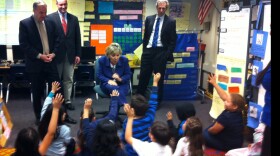 Sen. Barbara Boxer talks with first graders at Perkins Elementary School in Barrio Logan, Mar. 28, 2013. She was joined by (from left to right) San Diego Mayor Bob Filner, San Diego Unified Board of Education Vice President Kevin Beiser and San Diego Unified Board of Education President John Lee Evans.