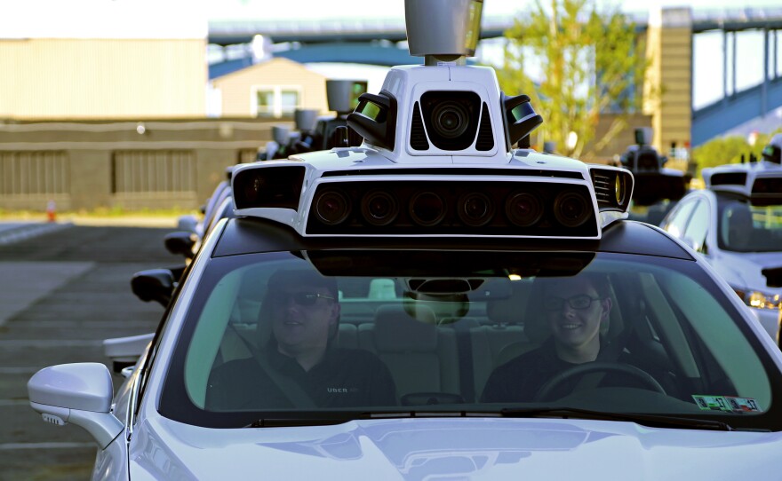 A pair of Uber technicians will ride inside each of the new self-driving cars offering rides to regular Uber users during an indefinite testing phase.