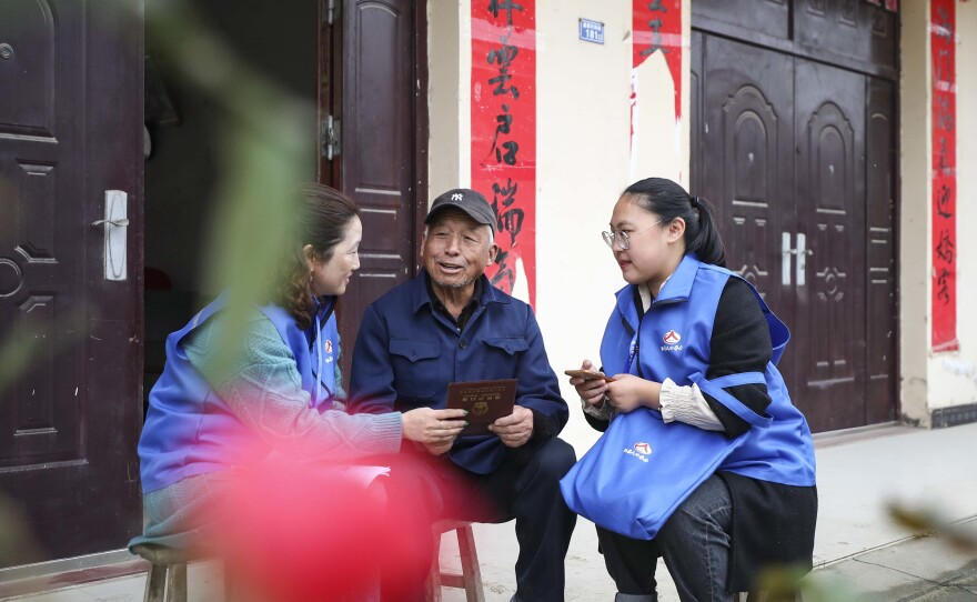 Workers collect demographic data in the the 7th population census on November 1, 2020 in China.