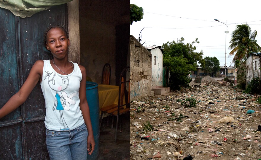 Project Drouillard resident Widline Charles, 21, fled her home during floods over Easter weekend this year. Months later, her street is still covered in a foot or more of mud, trash and sewage.