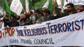 Members of the Association to Protect the Dignity of the Holy Prophet, or Tahafuz-e-Namwoos Risalat, join the Sunni Itehad Council in a protest march to denounce the Pope. The Vatican called for the abolition of Pakistan's blasphemy laws after a Christian woman accused of blaspheming the Prophet Muhammad was sentenced to death.
