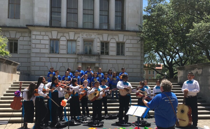 Angela Machado and her third-grade class perform at the University of Texas's Cinco de Mayo festivities.