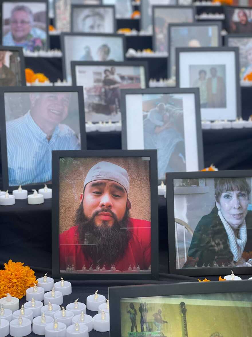 Photos of community members are pictured in the COVID-19 Altar de Muertos at the San Diego County Administration Center on November 1, 2021. 