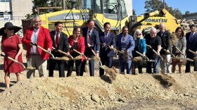 San Diego Mayor Todd Gloria (center) joins officials with the San Diego Community College District, Friday, breaking ground on the first affordable student housing project downtown, San Diego, Calif., Oct. 20, 2023