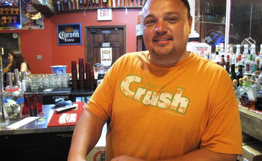 Rich Godlove, owner of Zen-Shi bar and restaurant in Frostburg, Md., says training paid for by the university has helped his staff recognize sophisticated fake IDs.