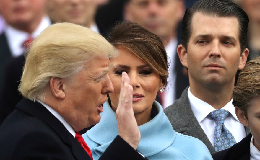 Donald Trump Jr., far right during his father's inauguration, has released an email exchange about setting up a meeting in 2016 with a Russian lawyer who he is told has damaging information about Hillary Clinton.