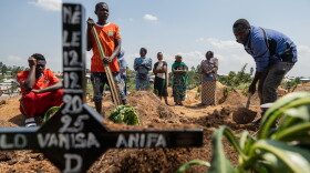 Relatives of Vanisa Anifa, a 6-month-old orphaned girl who died of Ebola, attend her burial, in Bunia, Congo, Friday, June 19, 2026.