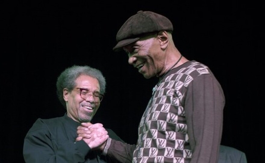 Albert Woodfox (center) is greeted by Robert King (right) at the Ashe Cultural Arts Center in New Orleans on Feb. 19, after his release from Louisiana State Penitentiary that day.