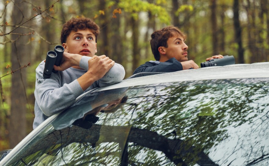 Otys Train, 16, (left) and teammate Jack Trojan, 17, search for different bird species while competing in the world series of birding at High Point State Park in New Jersey on May 9. They competed in the 43rd annual World Series of Birding where they counted as many bird species within New Jersey as they could in 24 hours.