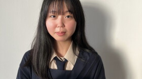 Rika Matsuda with the origami crane from her unsung hero, in 2023.