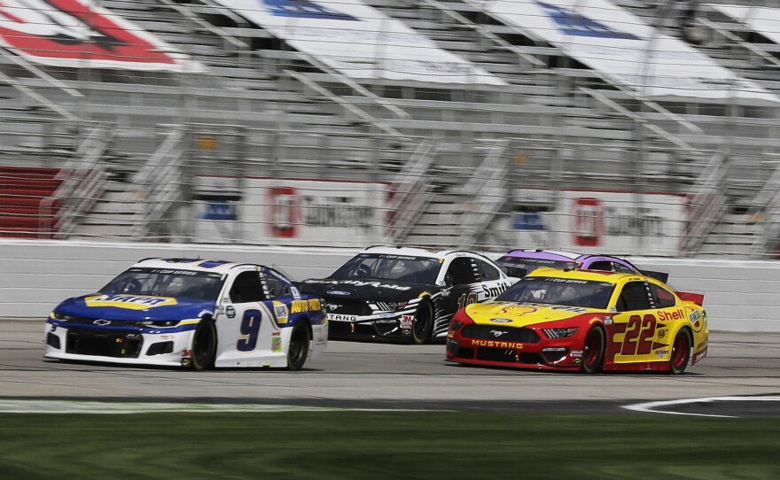 Chase Elliott (9), Aric Almirola (10) and Joey Logano (22) drive during a NASCAR Cup Series race Sunday at Atlanta Motor Speedway on Hampton, Ga. On Wednesday, NASCAR announced a ban of the Confederate battle flag.
