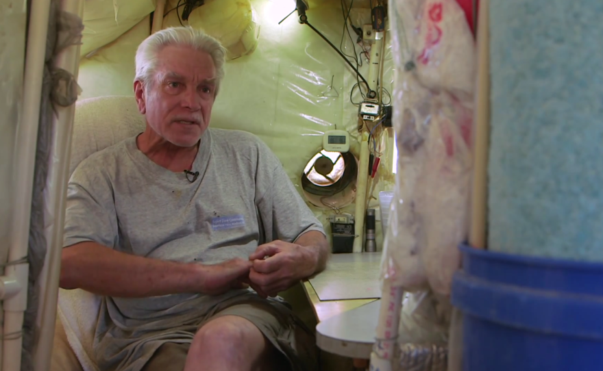 Slab City resident Gary Brown lives in an RV and is shown inside what he calls his cool cube, March 28, 2015.