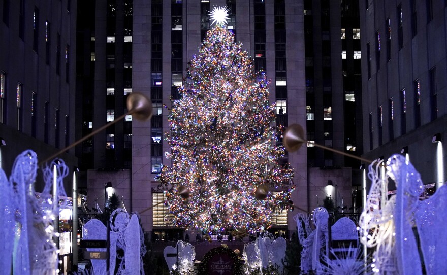 The Rockefeller Center Christmas tree stands illuminated following the 90th annual lighting ceremony, on Nov. 30, 2022, in New York.