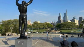 The Rocky statue overlooks the city skyline outside the Philadelphia Museum of Art in Philadelphia, Wednesday, April 22, 2026.