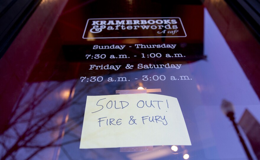 A sign posted at the door of Kramerbooks & Afterwords Cafe in Washington, D.C., announced that <em>Fire and Fury: Inside the Trump White House</em> was already sold out on Friday.
