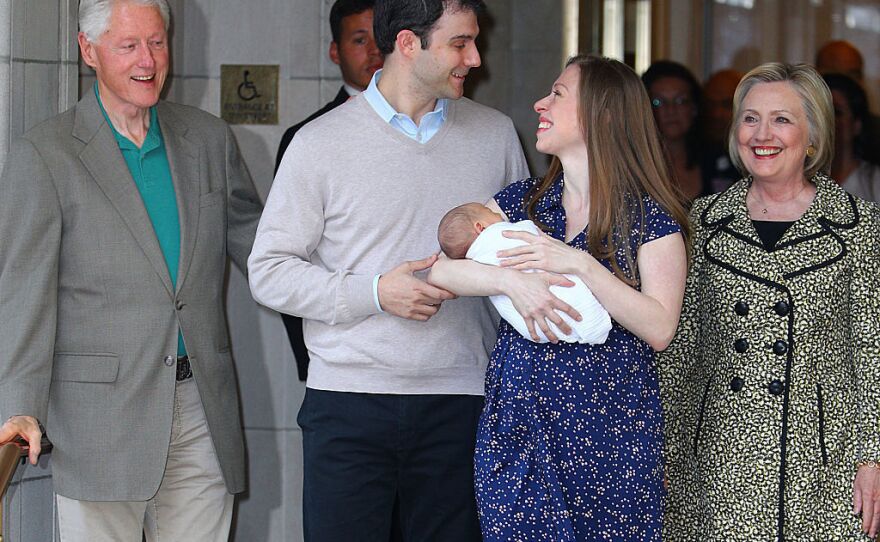 Chelsea Clinton and her husband, Marc Mezvinsky, leave the hospital after the birth of their son, Aidan, last month, along with her parents Bill and Hillary Clinton.