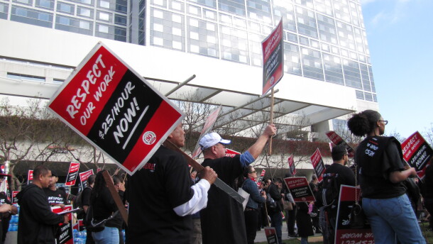 Hotel workers with Unite Here Local 30 rally outside the Hilton San Diego Bayfront in support of a $25 minimum hourly wage for service workers on Wednesday, May 1, 2024.