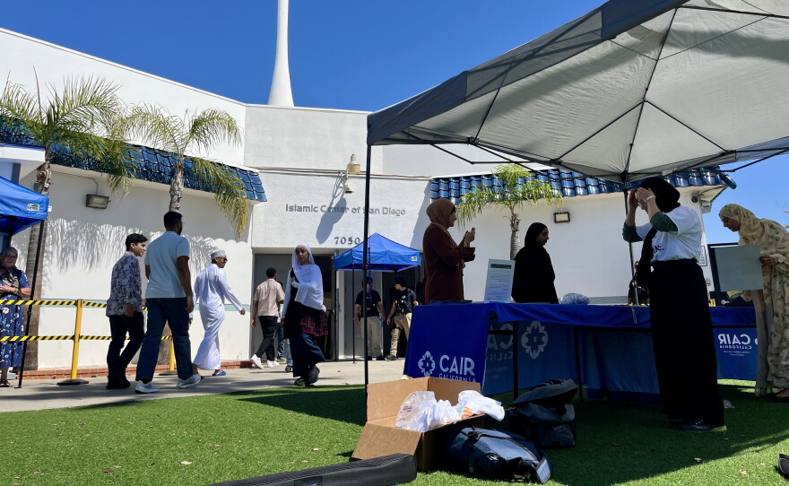 Organizers prepare voter registration tables outside of Islamic Center of San Diego, Sept. 18, 2026.