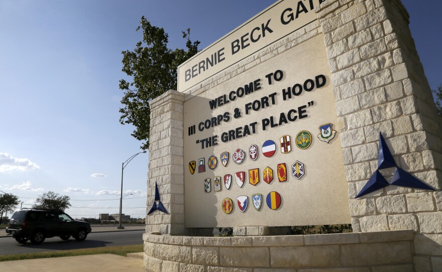 Traffic flows past a welcome sign at Fort Hood, which is being renamed in honor of Richard Edward Cavazos, the Army's first Hispanic four-star general.