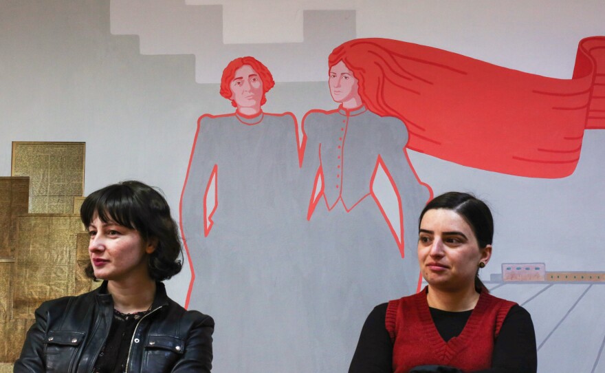 Participants attend a discussion of late 19th century, early 20th century female politicians in Georgia at the Barbare Jorjadze reading room.