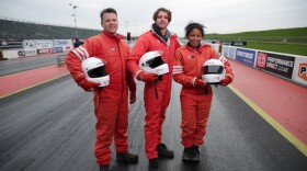 Paul, Alejandro and Marcia wearing their racing kit at Santa Pod after Demo 2. They have been drag racing to look at the Doppler effect and how sound and light waves are similar.