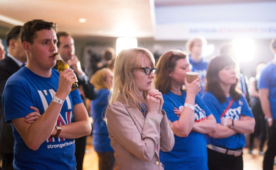 Supporters of the Stronger In campaign, which advocated for remaining in the EU, watch the results of the EU referendum being announced at London's Royal Festival Hall on Friday. Voters opted to leave the European Union.