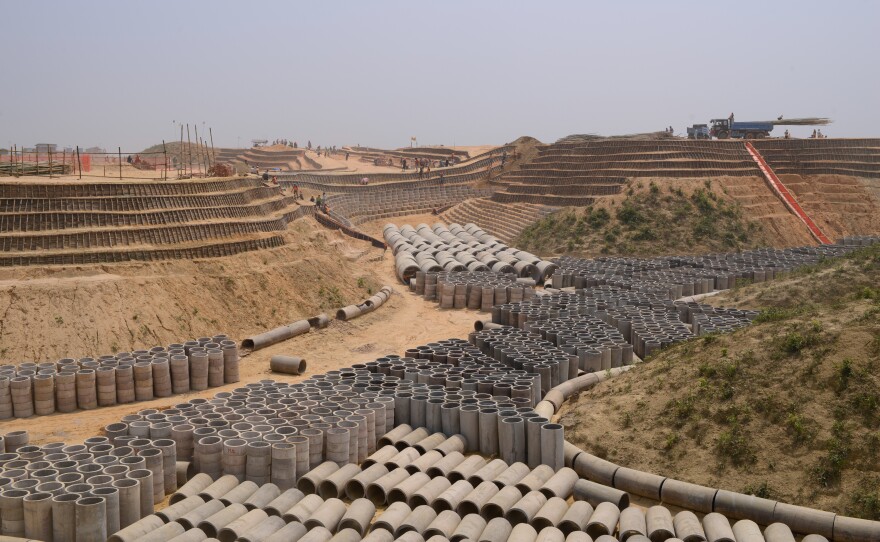 Construction is underway to put in drainage ditches and stabilize hillsides on the edges of the Kutupalong section of the sprawling refugee camp. The shored-up land will be used for new shelters for residents currently living in overcrowded areas of the settlement.