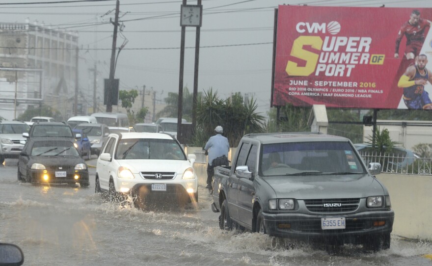 Heavy rain hits downtown Kingston, Jamaica, on Sunday ahead of Hurricane Matthew's expected arrival.