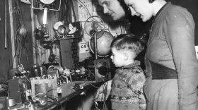 Stanley Hardman, an amateur radio operator, and his family look at transmitting equipment in 1939.