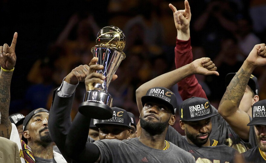 Cleveland Cavaliers' LeBron James celebrates with teammates after winning Game 7 of the NBA Finals against the Golden State Warriors in Oakland, Calif., on Sunday.