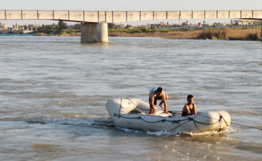 Search and rescue operations near the Iraqi city of Mosul were underway after a boat sank in the Tigris River on Thursday. Authorities say dozens of people, including many children, are confirmed dead.