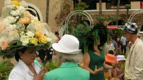 Ana Flora Royer and Lori Shelton chat with fellow racegoers about their entires in the annual hat contest at the Del Mar Racetrack on opening day.