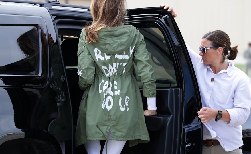 Mrs. Trump climbs back into her motorcade Thursday after traveling to Texas to visit a facility that houses and cares for children detained at the U.S.-Mexico border after entering the U.S. illegally.