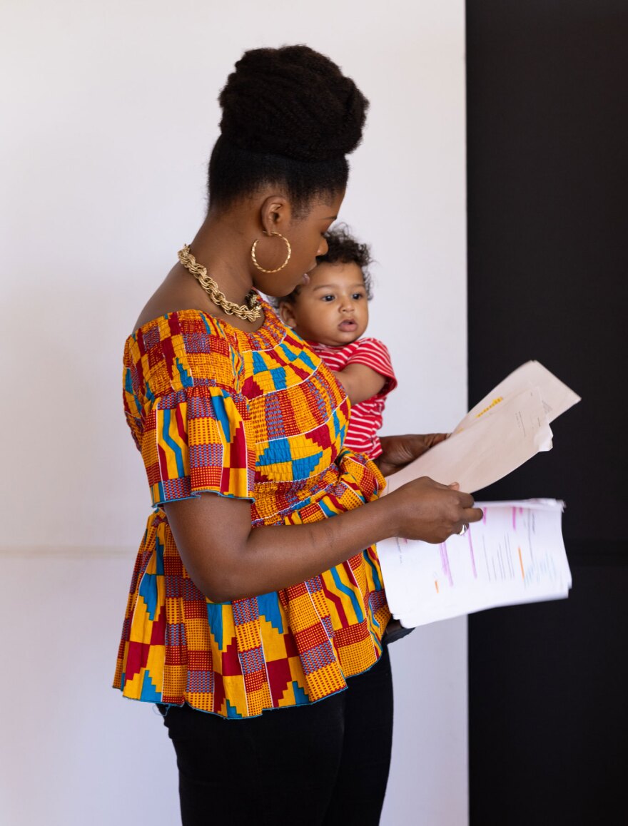 Actor Joy Yvonne Jones rehearses lines while taking care of her son.