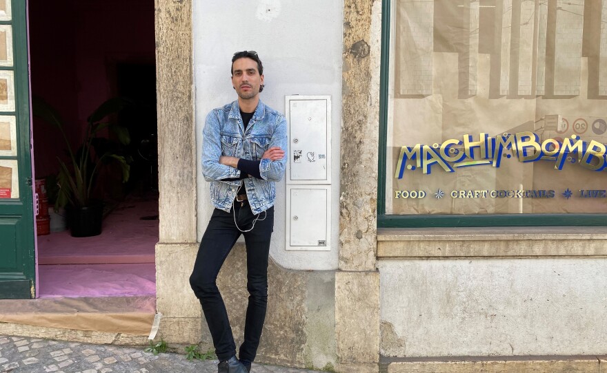 Marcio Duarte, owner of Machimbombo, a small cocktail bar in Lisbon, Portugal, stands outside his establishment. Business has been tough amidst nightlife restrictions during the pandemic.