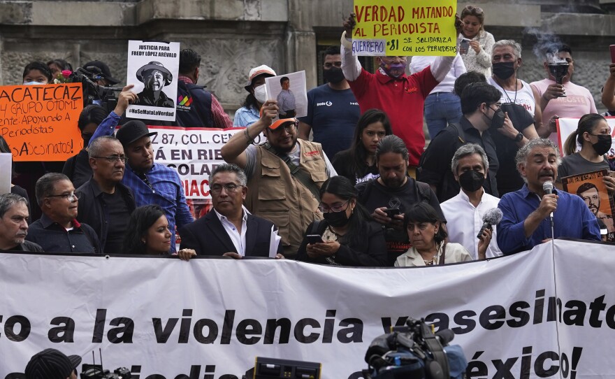 Journalists protest to draw attention to the latest wave of journalist killings, at the Angel of Independence monument in Mexico City, May 9, 2022.