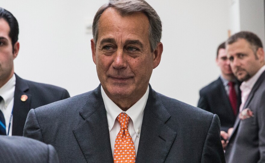 Speaker of the House John Boehner leaves after discussing the government shutdown with his fellow Republicans on Capitol Hill Saturday. Boehner reportedly told his colleagues that talks with the White House had ended without a deal.